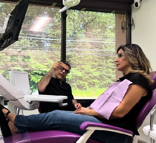 Woman receiving dental care from a dentist in a clinic.